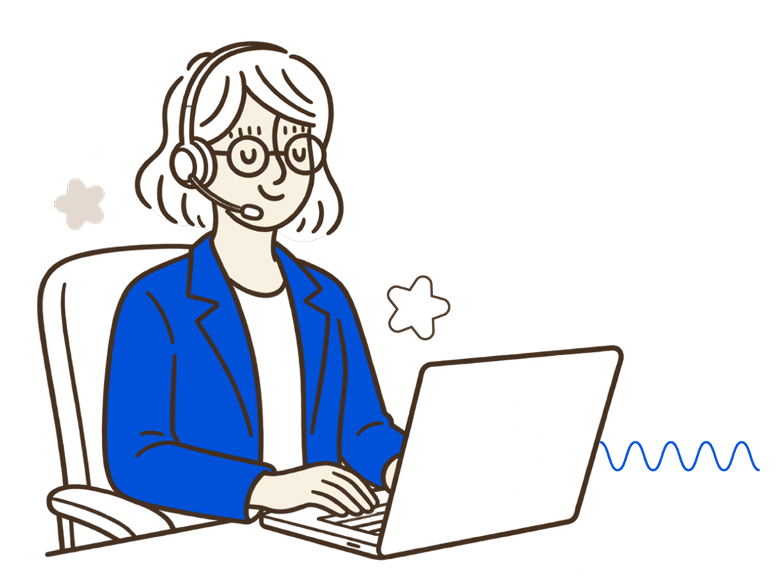 EL on a headset, typing on a laptop